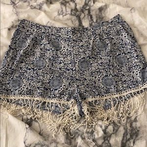 Navy blue and white shorts w/dangling string